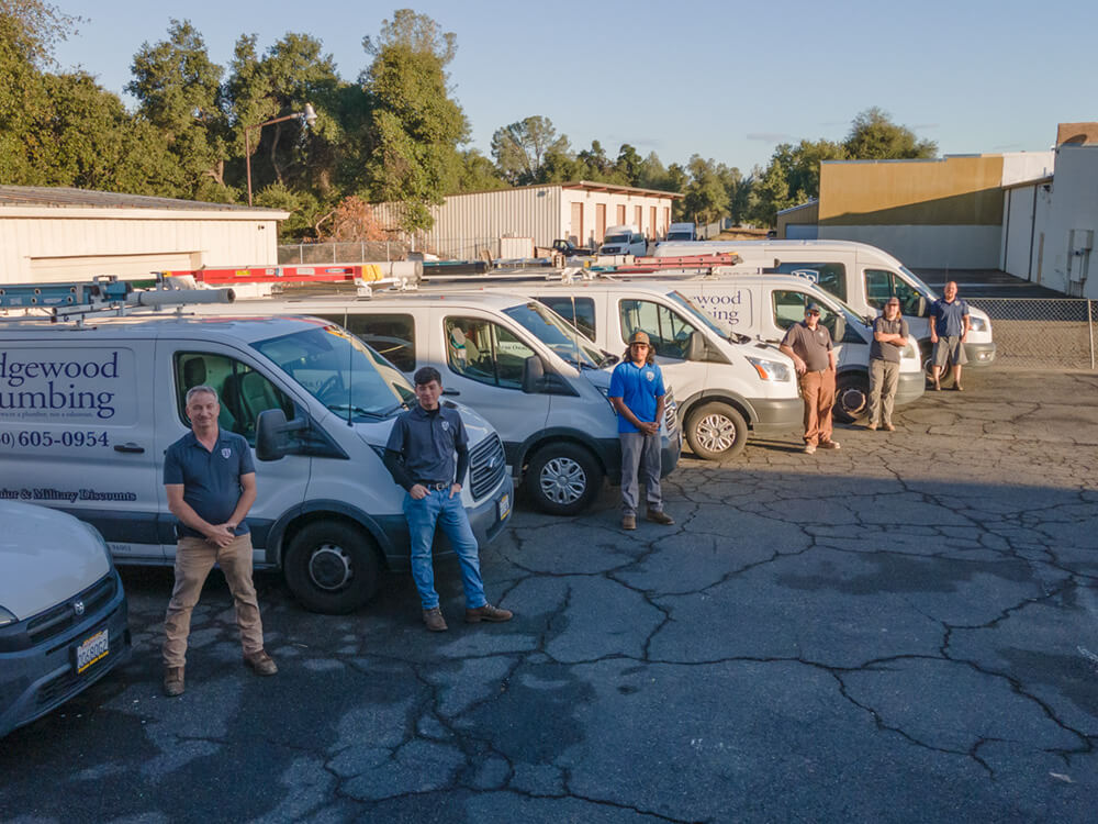 Edgewood Plumbing vans with plumbers